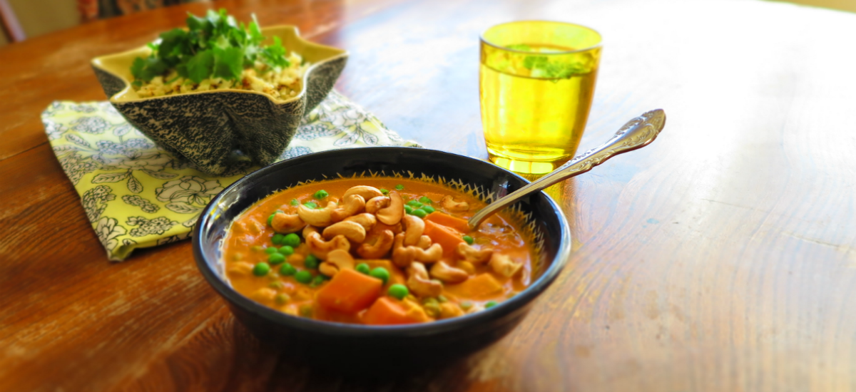 Cauliflower cashew korma, cashews roasted and creamed, chickpea, green pea and brown rice