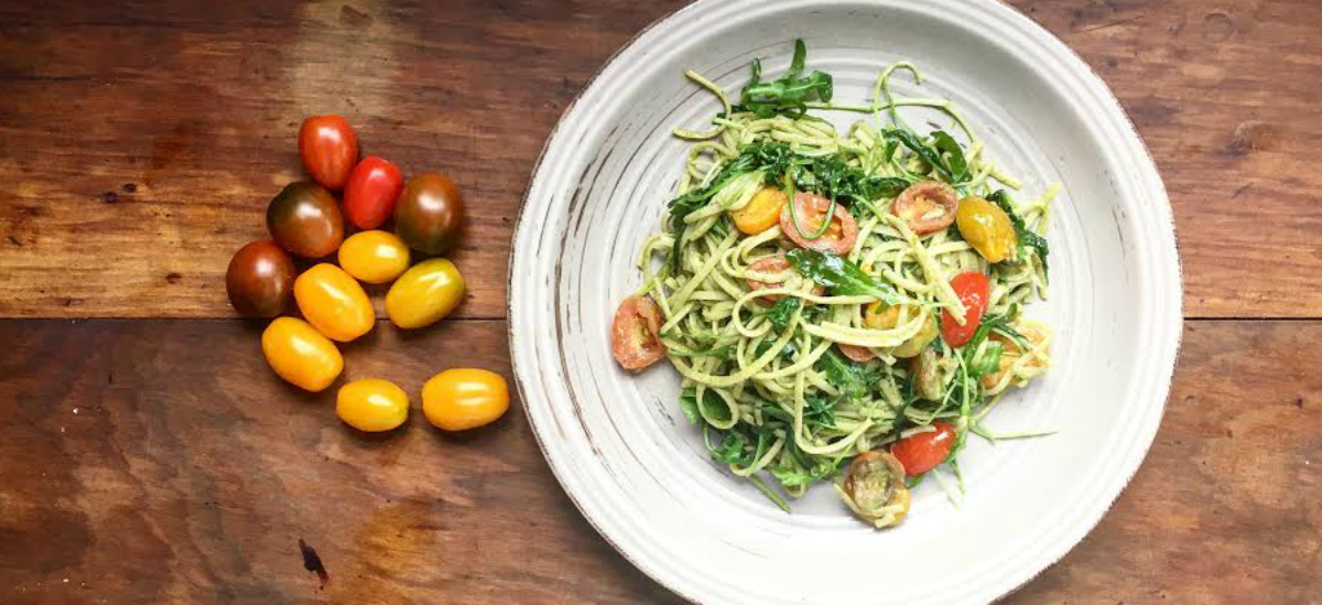 Basil and cashew pesto with courgette, cherry tomato, fettuccine and Parmesan