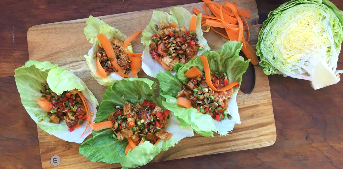 Tempeh lettuce cups with brown rice, hoisin and spiced pumpkin seeds