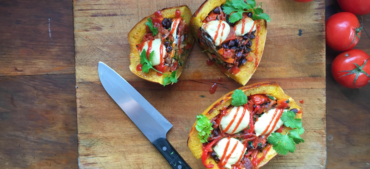 Spaghetti squash burrito bowl with sour cream and GDT hot sauce