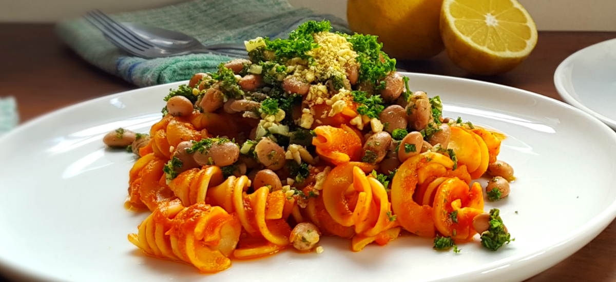 Pasta fagioli with arrabbiata sauce, lemony borlotti beans, parsley and Parmesan