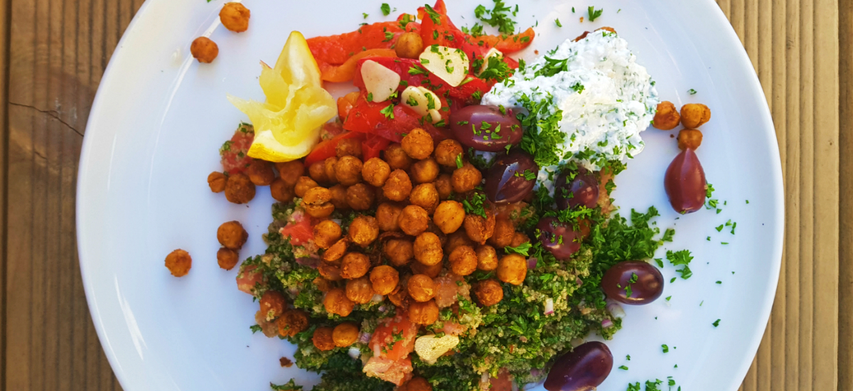 Mediterranean super salad with shawarma seasoned chickpeas, tzatziki and tabouli