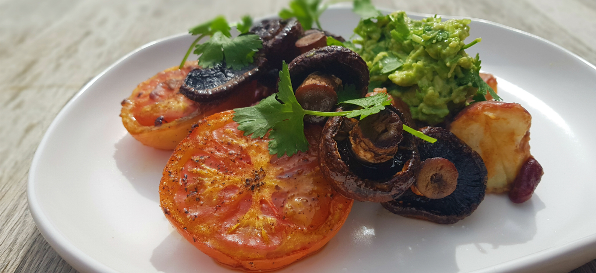 Tex-Mex burrito bowl with BBQ hash, bacon mushrooms and guacamole