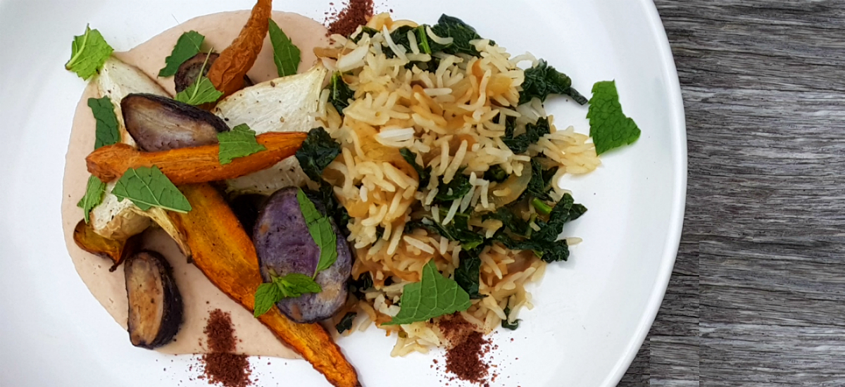 Baby root vegetables with brown rice, cavolo nero mujadara and white bean hummus