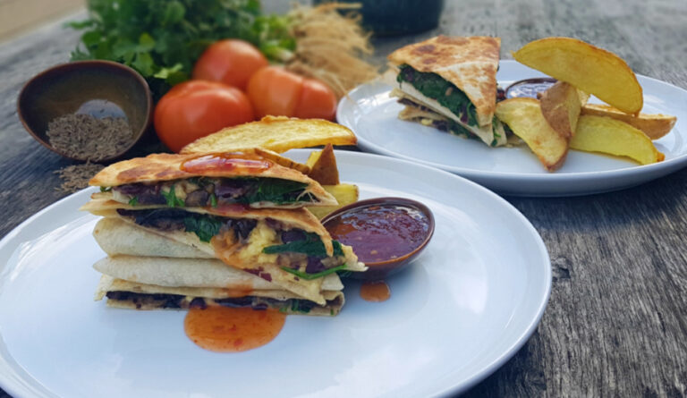Spinach and mushroom quesadillas with Angel Foods cheddar, wedges and salsa