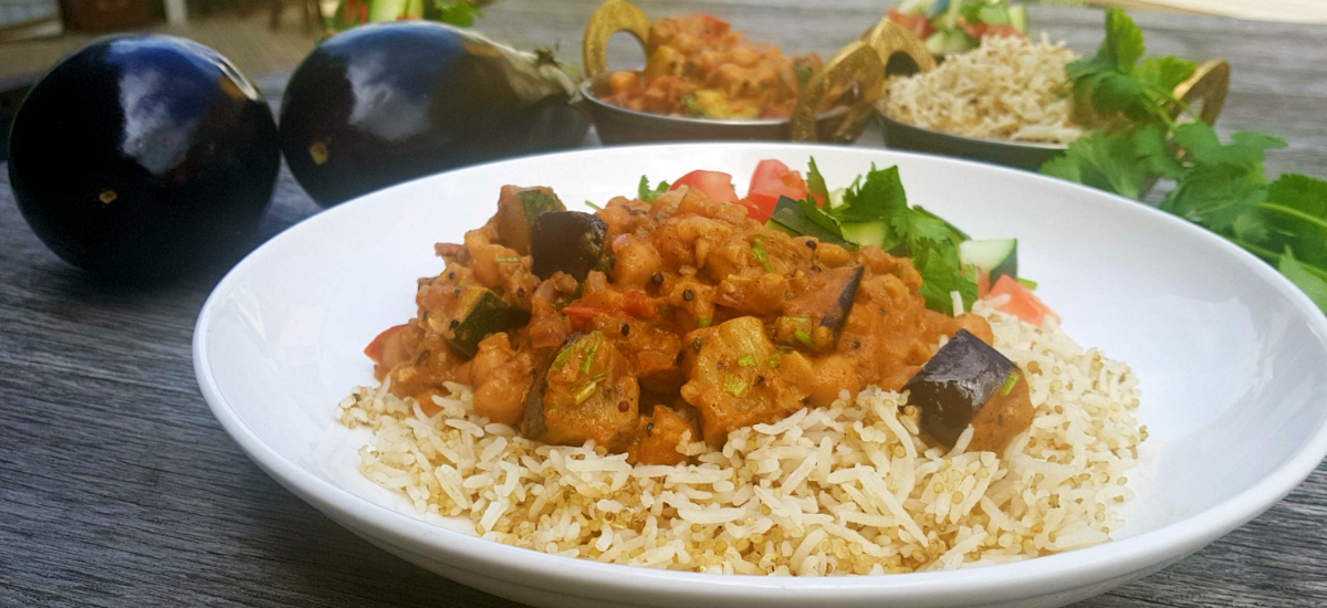 Smoky brinjal with chickpea and zucchini curry, local quinoa and tomato salad