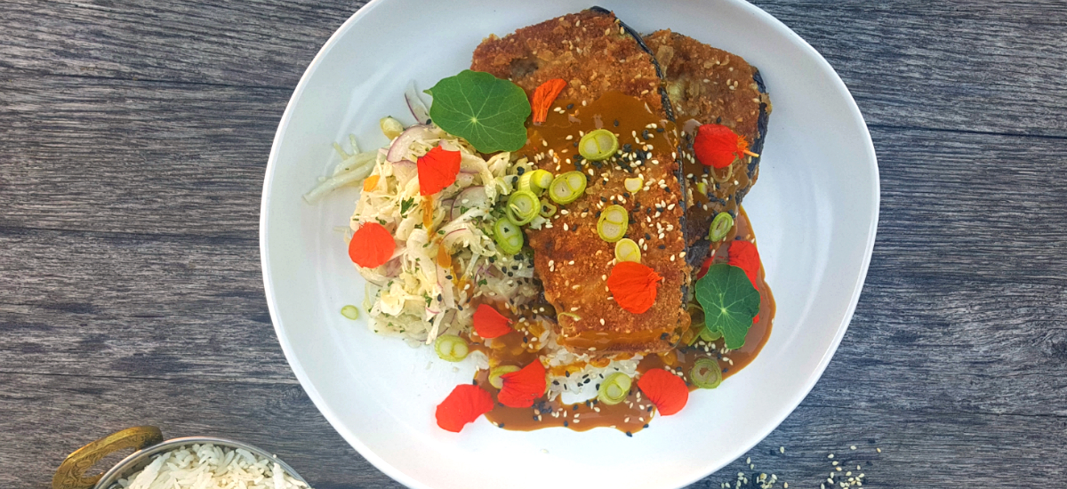 Eggplant katsu with sticky rice, miso beetroot, carrot slaw and curry gravy