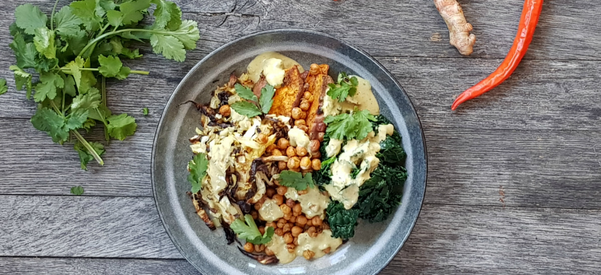Curried kumara with chickpeas, cabbage, steamed kale and green curry tahini
