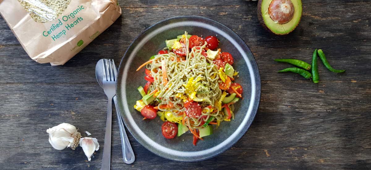 Spring noodle salad with avocado hemp seed sauterkraut and lemon maple dressing