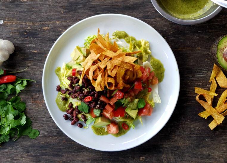 Taco salad garlic roast pepper cumin beans romaine avocado and tomatillo salsa