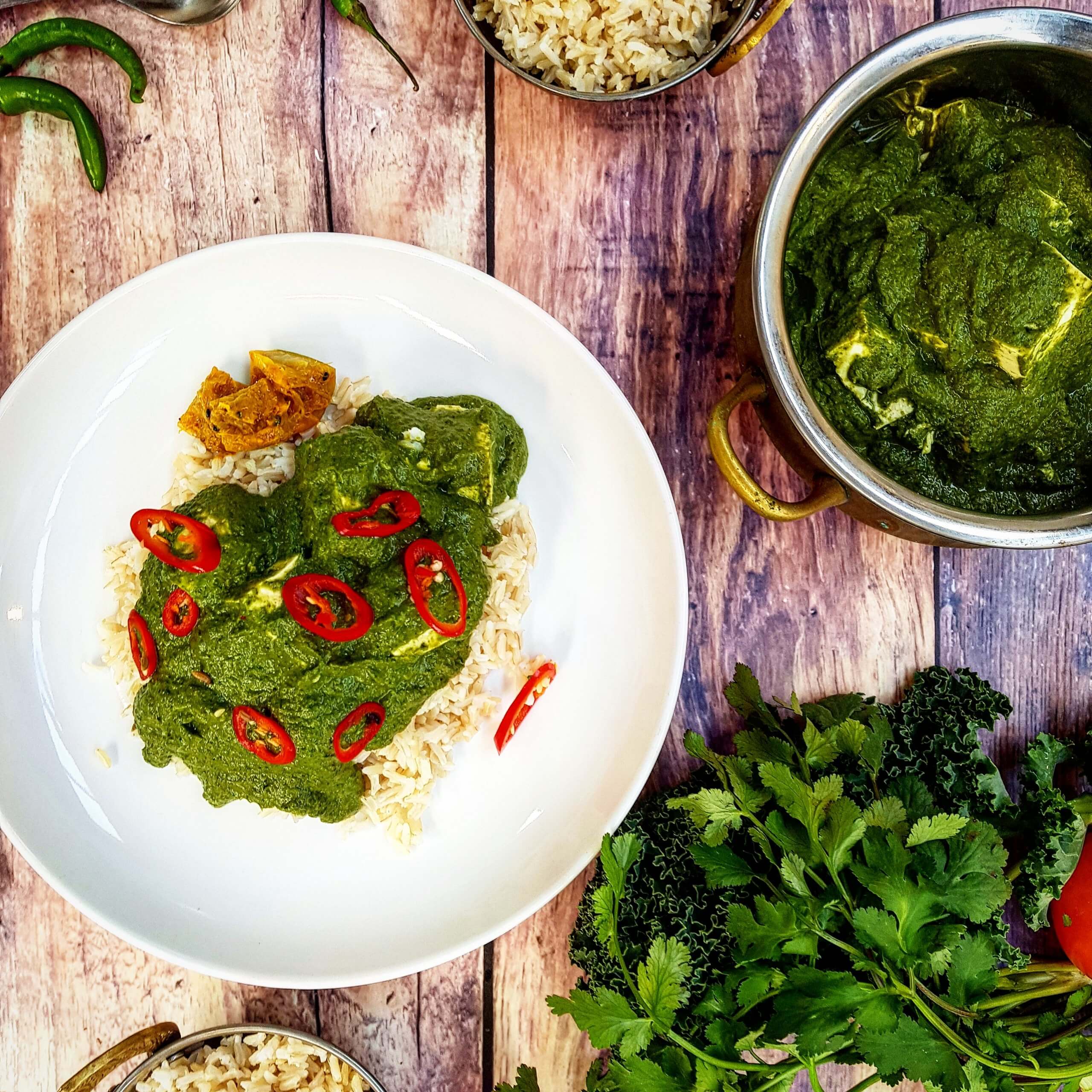 Tofu saag paneer with local greens, brown rice and lime pickle