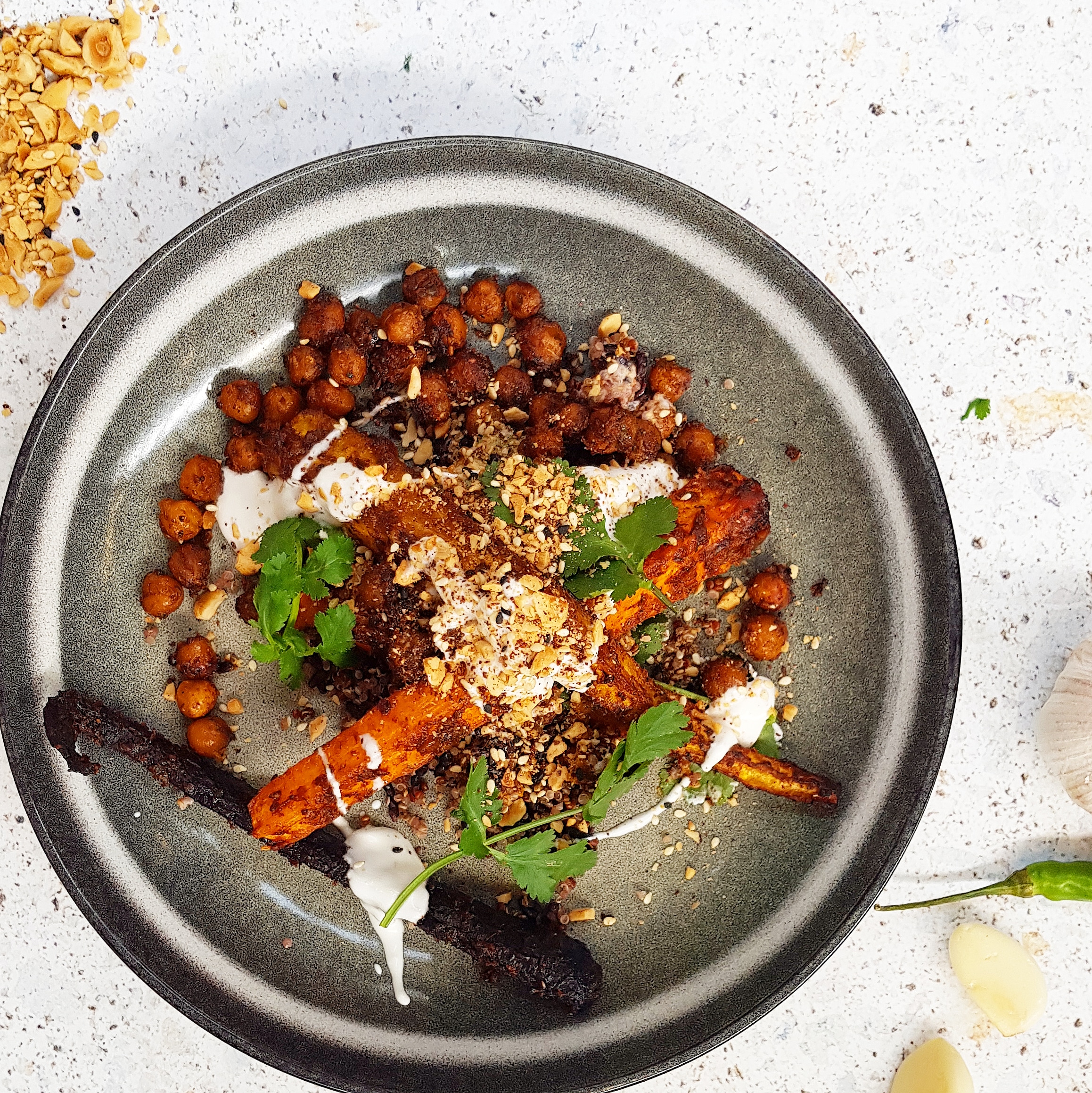 Harissa carrot and chickpeas with quinoa, black rice and rose yoghurt