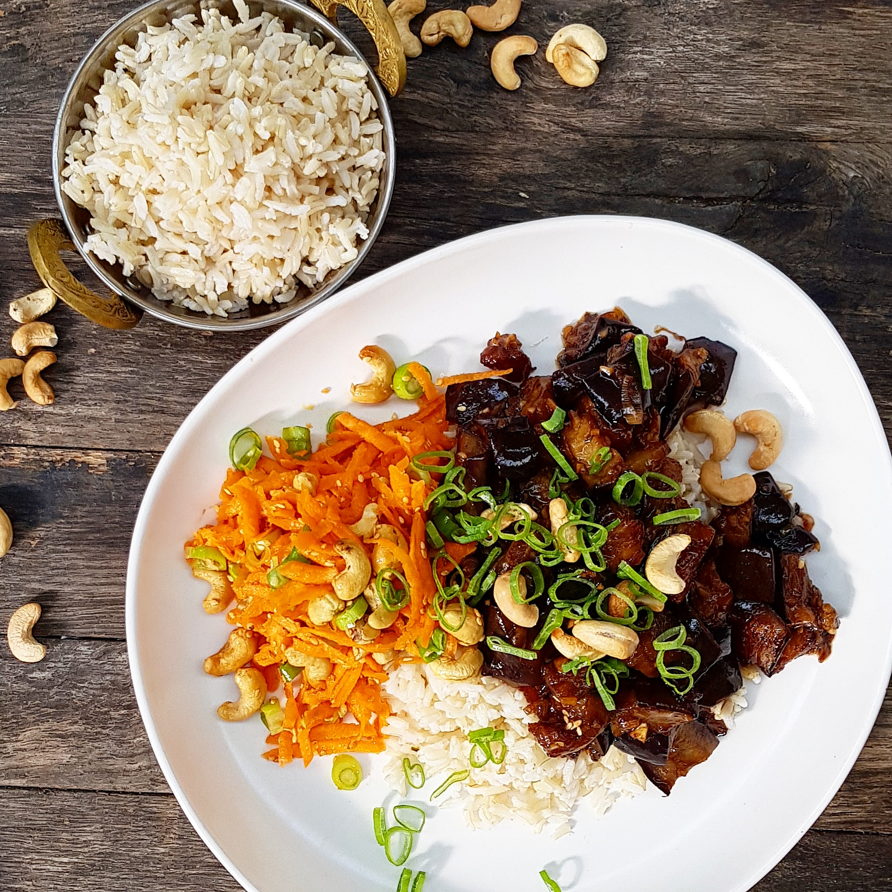 Eggplant and tamarind stir fry, kecap manis, carrot sesame slaw, brown rice and cashew