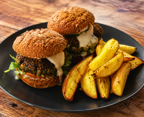 Falafel burgers, herb aioli, sundried tomato hummus and wedges
